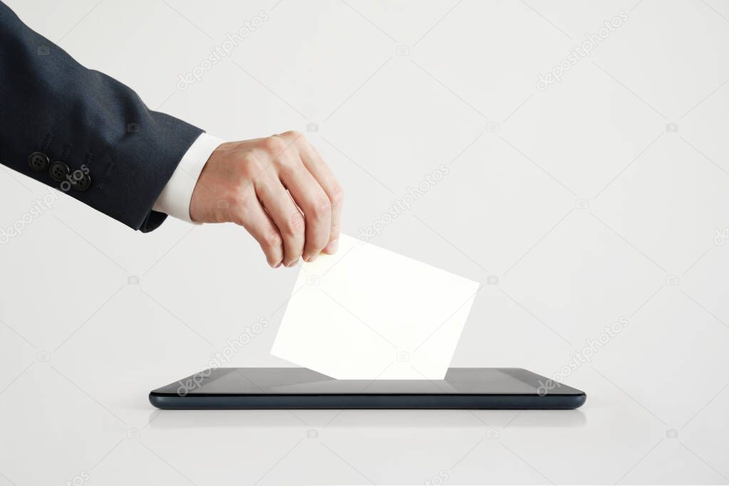Businessman Voting Online Using Digital Tablet.