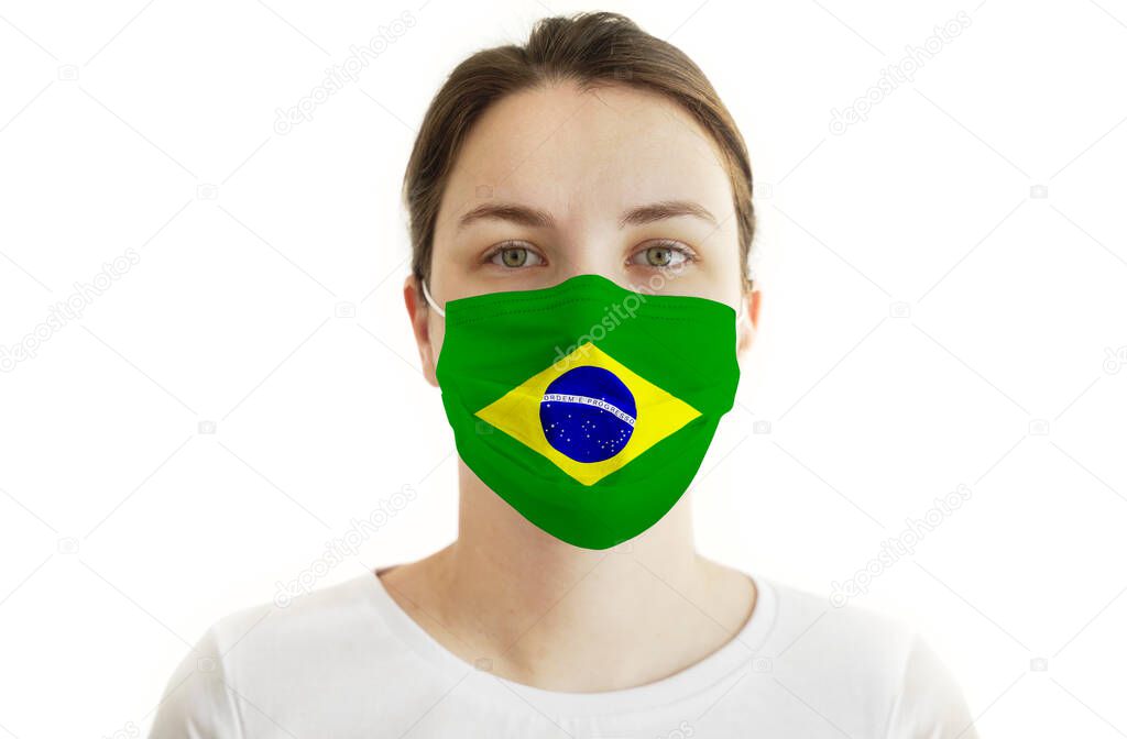 Coronavirus COVID-19. Young Woman in Face Mask with Brazilian Flag