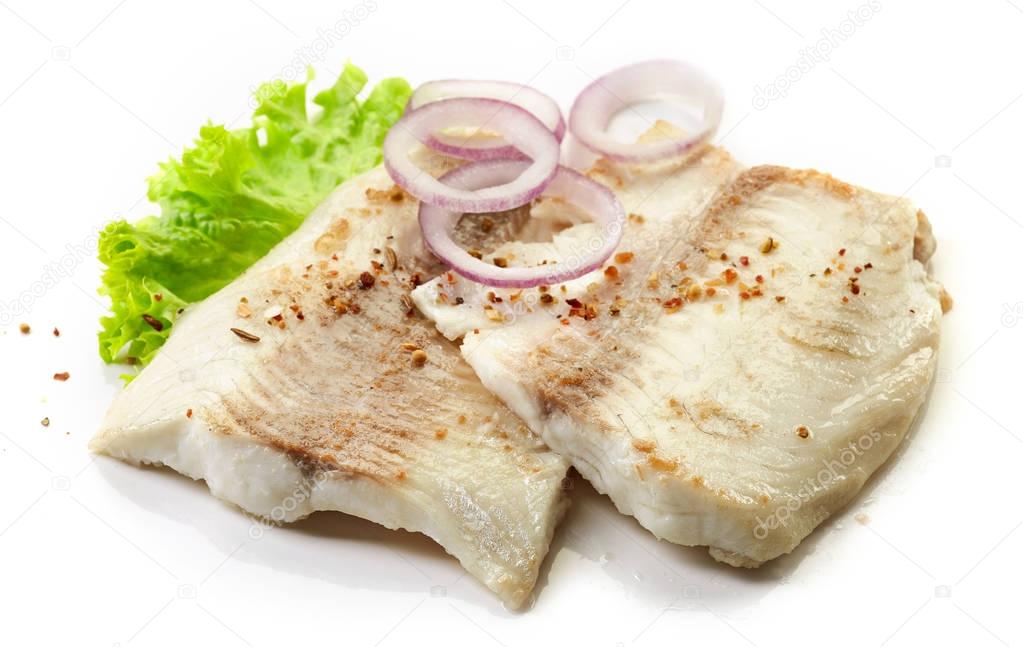 roasted bream fish fillets on white background