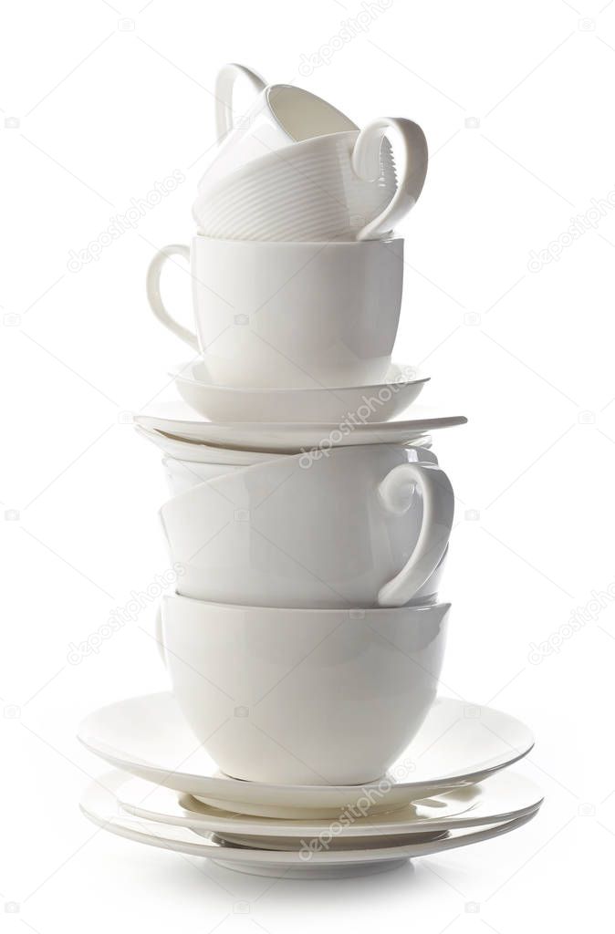 stack of white cups and plates