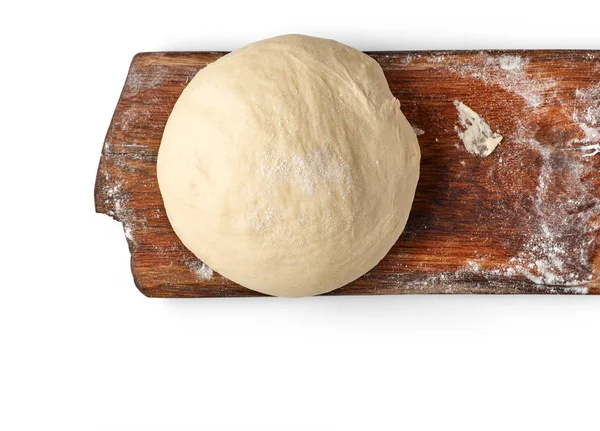 Fresh raw dough on wooden board — Stock Photo, Image