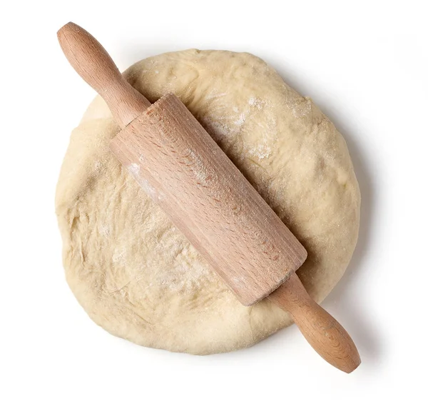 Fresh raw dough and rolling pin — Stock Photo, Image