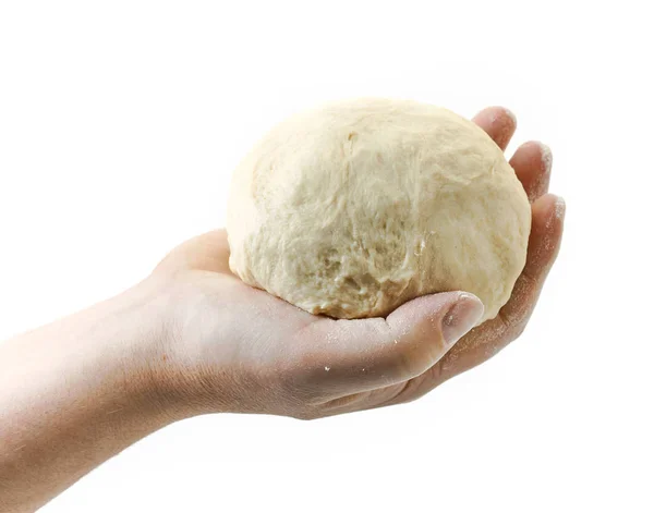 Fresh dough ball in human hand — Stock Photo, Image