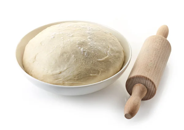 Bowl of fresh dough and rolling pin — Stock Photo, Image