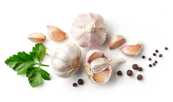 Knoblauch, Petersilie und Pfeffer auf weißem Hintergrund — Stockfoto