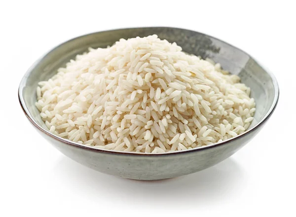 Bowl of raw long grain rice — Stock Photo, Image