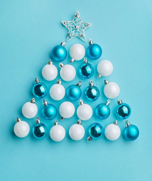 Christmas tree made of white and blue baubles — Stock Photo, Image