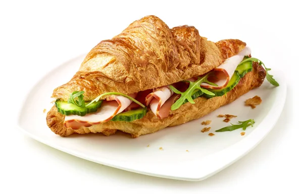 Croissant with ham and cucumber — Stock Photo, Image