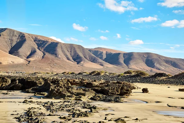 Volcanic hills and blue sky — Stock Photo, Image