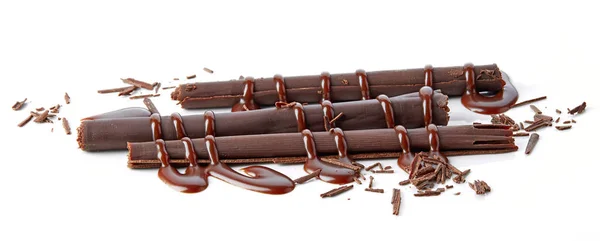 Paus de chocolate e molho de chocolate — Fotografia de Stock