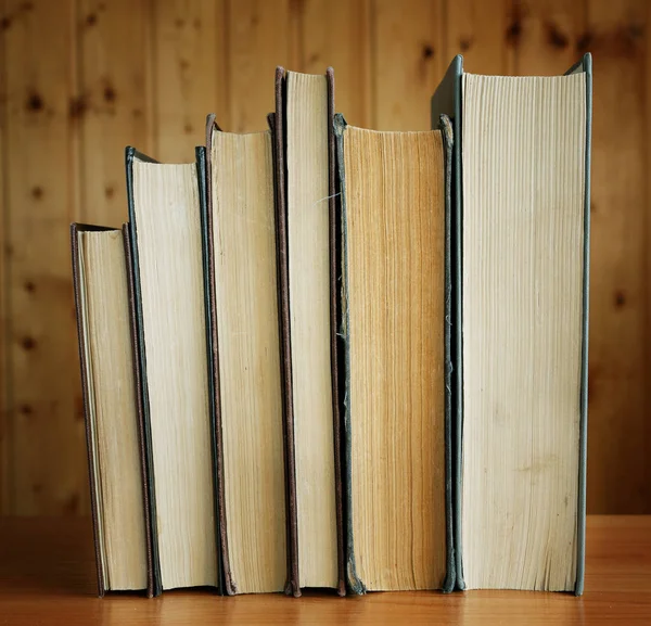 Old books in brown and grey cover close up — Stock Photo, Image