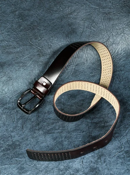 Female belt against from a  leather grey — Stock Photo, Image