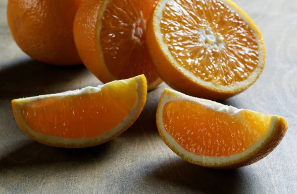 Orange slice close-up on the table — Stock Photo, Image