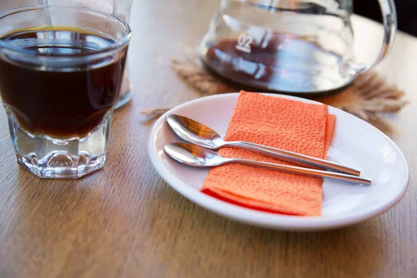 Cup of coffee on the table in the cafeteria — Stock Photo, Image