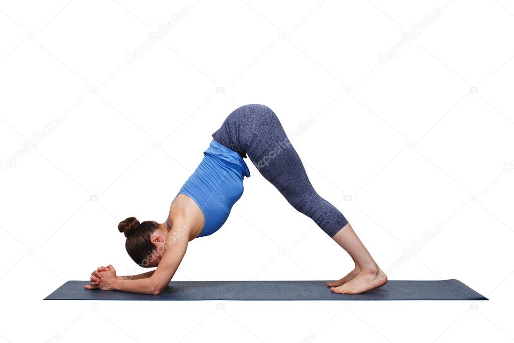 Woman doing Hatha yoga asana Ardha Pincha Mayurasana
