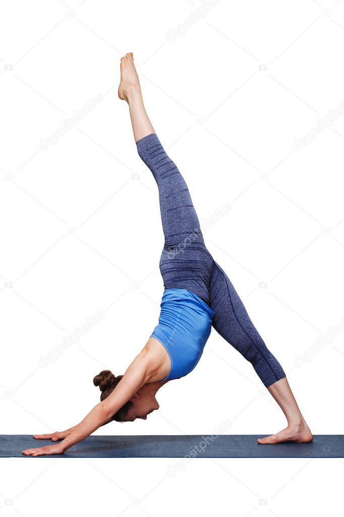 Woman doing Hatha yoga Eka pada adhomukha svanasana