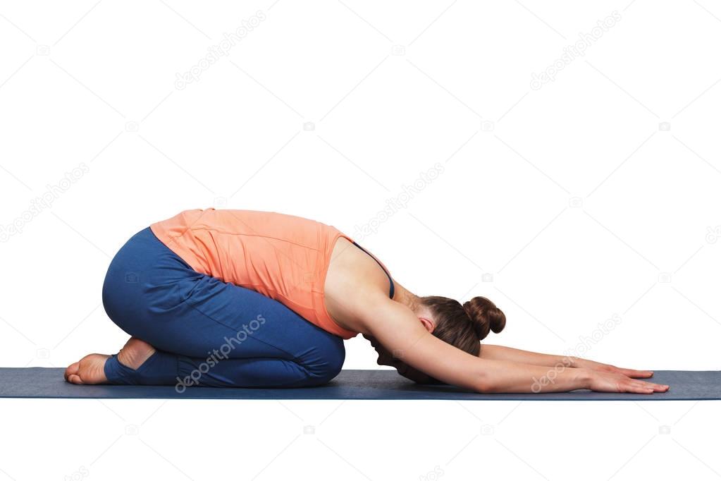 Woman relax in Hatha yoga asana Balasana child pose
