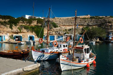 Fishing boars in harbour in fishing village of Mandrakia, Milos island, Greece
