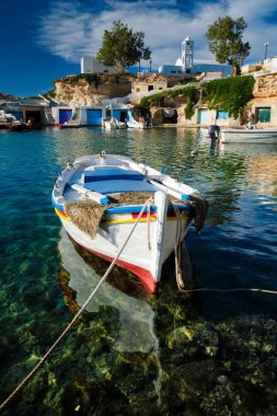 Fishing boars in harbour in fishing village of Mandrakia, Milos island, Greece