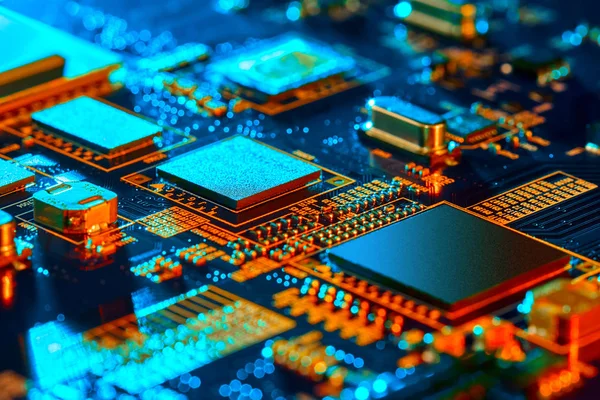 Electronic circuit board with electronic components such as chips close up. The concept of the electronic computer hardware technology.