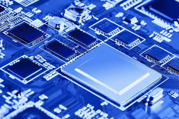 Electronic circuit board with electronic components such as chips close up. The concept of the electronic computer hardware technology.