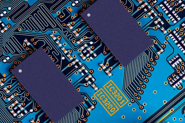 Electronic circuit board with electronic components such as chips close up. The concept of the electronic computer hardware technology.