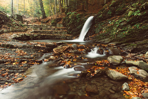 Autumn mountain waterfall