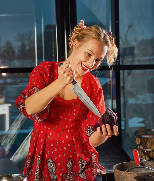 Aggressive blonde women preparing food vegetables