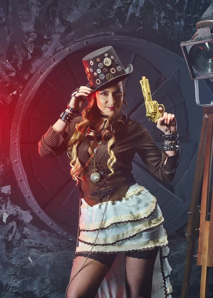 Steampunk woman with mechanical gun