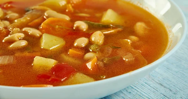 Israeli White Bean Soup, chicken broth and beans.