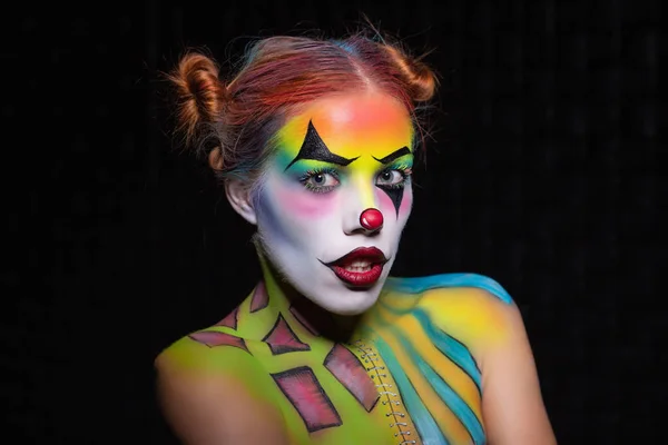Nice woman with a body art clown — Stock Photo, Image