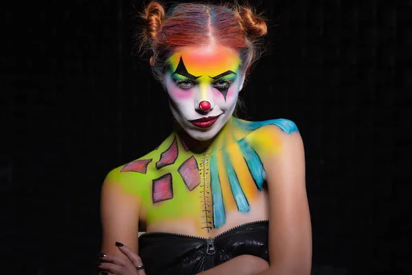 Nice lady with a face painting clown — Stock Photo, Image