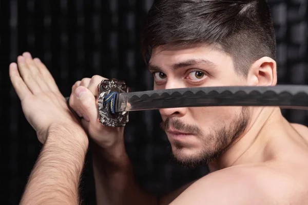 Portrait of pretty guy posing in studio — Stock Photo, Image