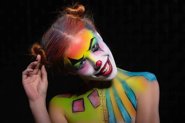 Smile lady with a face painting clown — Stock Photo, Image