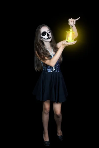 Halloween. Girl with a flashlight in his hand — Stock Photo, Image