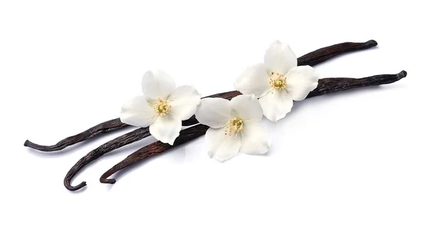 Bastoncini di vaniglia con fiori — Foto Stock