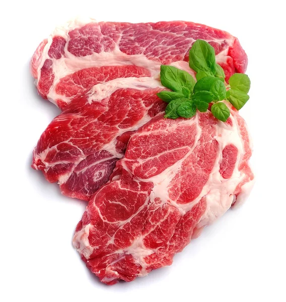 Pork meat with basil herbs — Stock Photo, Image