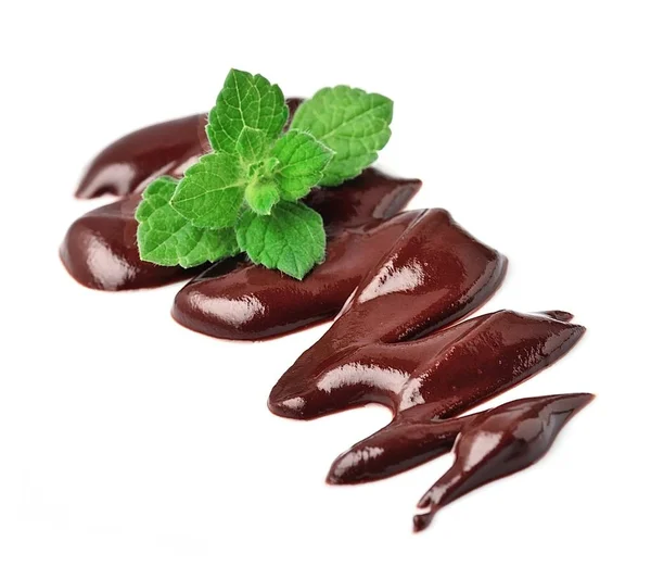 Liquid chocolate with mint. — Stock Photo, Image