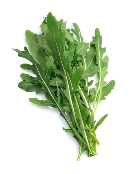 Salade de roquette isolé blanc fermer. Feuilles de rucola  . — Photo