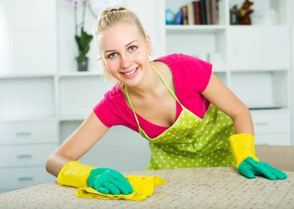 Blond girl cleaning surfaces at hom — Stock Photo, Image