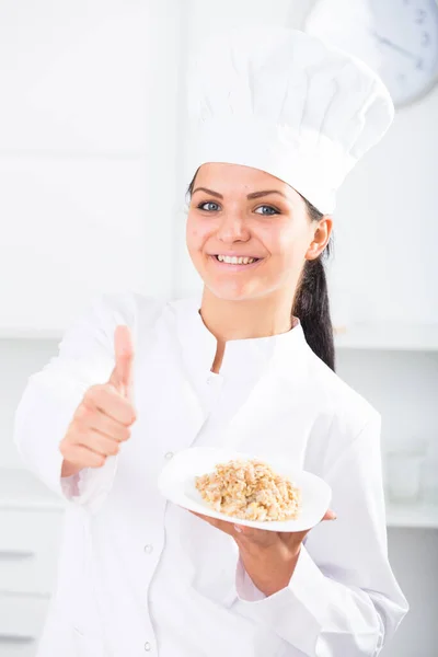 Brunette Girl Cook Holding Plate Porridge — Stock Photo, Image