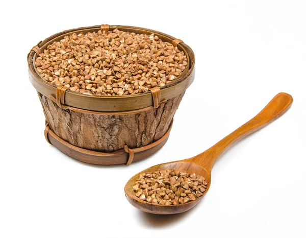 Wooden bowl with buckwheat — Stock Photo, Image