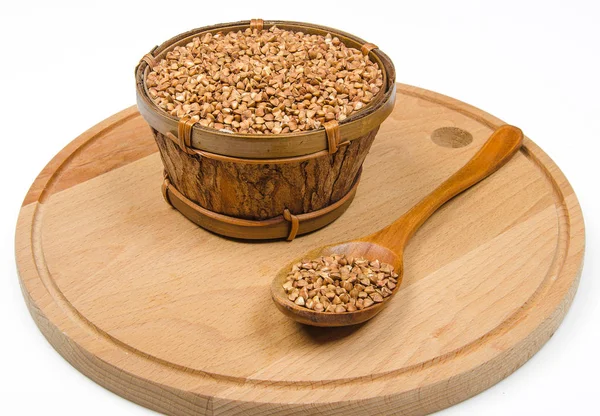 Ciotola di legno con grano saraceno — Foto Stock