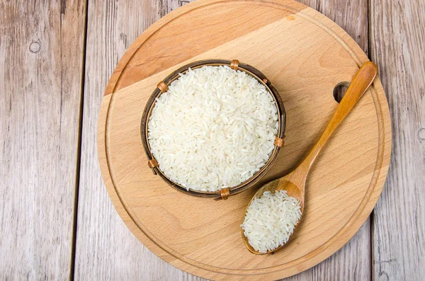 Wooden bowl with rice — Stock Photo, Image