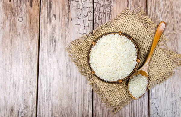 Wooden bowl with rice — Stock Photo, Image