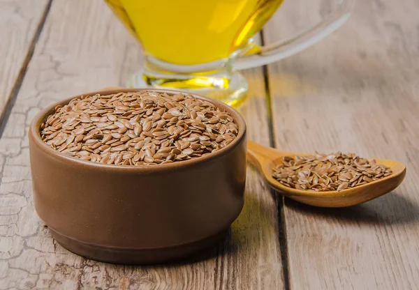 Flax seeds on table — Stock Photo, Image