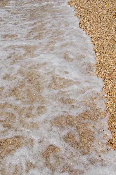 Kiezels en zand — Stockfoto