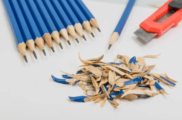 Graphite pencils with stationery knife — Stock Photo, Image