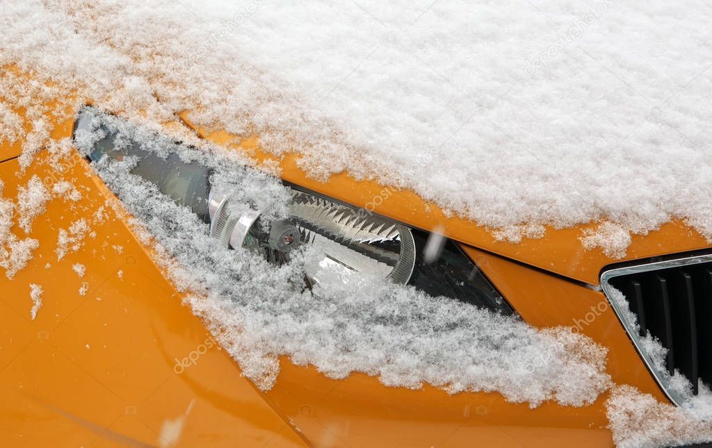 snowy car headlight.