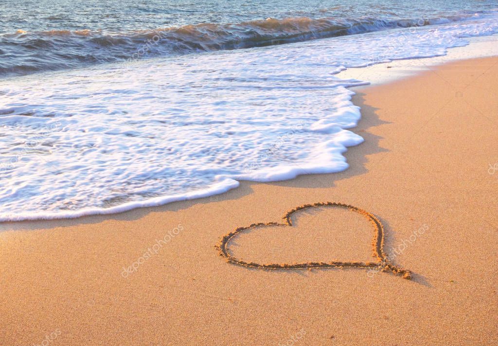 Heart on beach. 